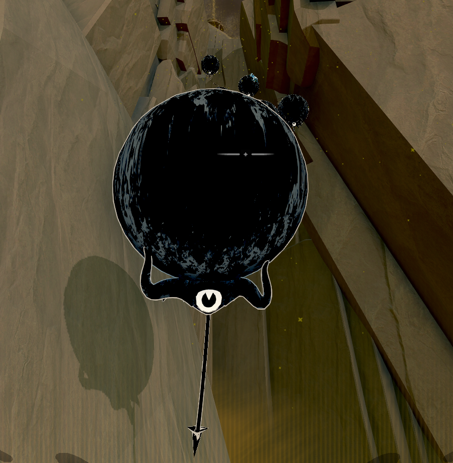 a picture of an enemy balloon. it's a black orb with a demon tail hanging down below it!